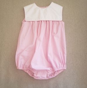 Classic pink and white outfit with bib collar
